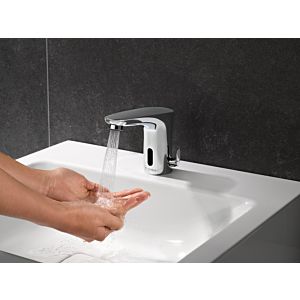 Schell Modus E electronic washbasin fitting 021730699 with plug-in power supply 6 VDC, 100-240 VAC, 50-60 Hz, chrome-plated